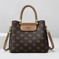 Brown monogram tote bag with braided handles and adjustable shoulder strap in classic print - Brown