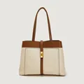 Bolso tote bicolor de cuero blanco roto y marrón oscuro con hebilla dorada - Blanco Y Marrón (superficie De Poliuretano)