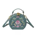 Elegant round crossbody bag with traditional Chinese embroidery in mint green finish - Aqua