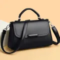 Chique zwarte lederen crossbody handtas met handvat voor dagelijks woon-werkverkeer - Zwart
