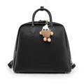 Black pebbled leather tote bag with white stitching and brown plush charm - Black