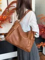 Large dark brown tote bag with woven shoulder strap detail and vintage texture finish - Tobacco Brown