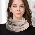 Light gray pure wool knit neck gaiter shown on a model for a warm winter look - One Size / Khaki