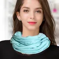 Soft light blue wool knit infinity scarf for women showing cozy double-loop wrap fit - One Size / Aqua Blue