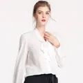 Elegant white silk long-sleeve shirt for women featuring a pussy-bow neck and draped fit - L / White