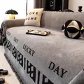 Gray chenille sofa throw cover with black geometric patterns and tassels - 180x130 / Gray