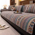 Copridivano bohémien in ciniglia con motivi geometrici arancioni e blu decorativi - 110x210 / Grigio
