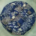 Detail of round Japanese style seat cushion in navy blue cotton linen with floral prints - New Pattern-17