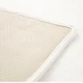 Non-slip backing of white plush rug featuring anti-skid dots and reinforced edges - 70cmx70cm / Off-white
