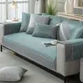 Close-up of summer ice silk sofa cushion with green stripes and decorative woven tape - Chair Pad (45x45) / Green