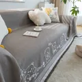 Detail of dark gray cotton linen sofa cover with white bear pattern and fringed edges - 180*130 / Cotton Bear-Khaki