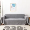 Wasserdichter grauer Sofaüberwurf mit weicher Stricktextur auf modernem Sofa - 180x180cm / Grau
