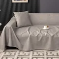 Waterproof light gray sofa cover in soft fabric draped over a couch with matching pillows - 210*130 / Light Gray