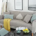 Nordic minimalist cotton sofa cover in beige with leaf pattern quilting and green pillow - 70*70 / Brown