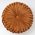 Round pumpkin-style velvet cushion in caramel yellow with elegant pleated texture - Orange