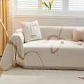 Abstract chenille sofa cover with cream and brown patterns and fringed edges - Khaki