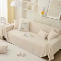 Copridivano minimalista beige crema con eleganti bordi a balze e tessuto tramato - 180x130 / Beige