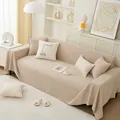 Copridivano beige in velluto a coste con cuscino viso minimalista e bordi ondulati - 180x130 / Color Tè al Latte