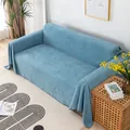 Dettaglio del copridivano azzurro in ciniglia con bordo decorativo in perle bianche e nere - 180*90 / Strato Singolo / Azzurro