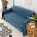 Dettaglio del copridivano in ciniglia blu con frange a pompon bicolore in un interno - 180*90 / Strato Singolo / Blu scuro