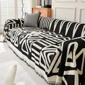 Manta geométrica moderna en blanco y negro para sofá con elegantes borlas tejidas - 180*90 / Negro Bohemio