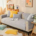 Grey quilted plush non-slip sofa cover and colorful pillows in a cozy living room - Small Square Mat (70x70cm) / Dark Gray