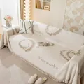 Housse de canapé tricotée blanc crème avec pompons et motif circulaire de feu d'artifice - Blanc cassé/Khaki