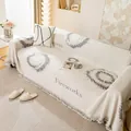 Housse de canapé blanc crème avec motif de feux d'artifice gris et franges - Beige/Gris