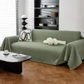 Funda de sofá de color verde judía con textura de gofre sobre un sofá de sala de estar - Verde matcha