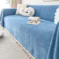Blue chenille sofa cover with herringbone weave and colorful pom-pom tassel trim - Blue