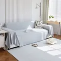 Copridivano in maglia grigio chiaro con trama a rombi e dettagli con frange - Grigio chiaro