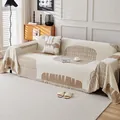 Housse de canapé en chenille beige avec motifs géométriques marron et pompons - 180*130 / Impression-Café