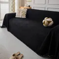 Close-up of black herringbone sofa cover with fringe detail and textured fabric - 180*90 / Black