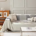Copridivano in ciniglia beige con motivi ad arco grigi, frange e cuscino decorativo - Serie Seya / 180*90 / Grigio