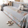 Copridivano boho in ciniglia grigio chiaro con motivi geometrici a stella e frange - 180x380cm / Grigio