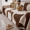Couverture de canapé tricotée géométrique marron et beige avec détails franges - Série Mika / 180x90cm / Marron