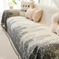 Beige and dark gray pine tree patterned sofa cover with decorative fringed edges - Compact / Gray