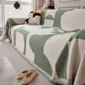 Housse de canapé géométrique vert et crème avec franges pour décor moderne - Série Mika / 180x90cm / Vert
