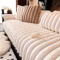Close-up of thick striped faux rabbit fur sofa cushion with soft plush texture in cream white - 110x210cm / White