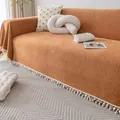 Orange chenille sofa cover featuring herringbone texture and colorful pom pom tassels - Orange Red