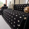 Modern black and white checkered fuzzy sofa cover with tassel fringe detail - 180*130 / Black