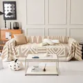 Copridivano in ciniglia beige con motivo geometrico e nappe per il soggiorno - Taglia Media (180*90) / Color Tè al Latte