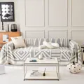 Copridivano in ciniglia grigio e bianco con motivi geometrici e dettagli di frange - Taglia Media (180*90) / Grigio
