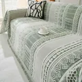 Sage green and cream bohemian chenille sofa cover with fringe and geometric texture - Green