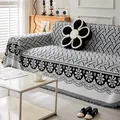 Nordische schwarz-weiße Boho Strick-Sofadecke mit eleganten Fransen - 180x150cm / Schwarz