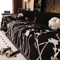 Black chenille sofa cover featuring white floral patterns and tassel edges with matching pillow - 180*130 / Black