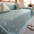 Detalle de funda de sofá de verano verde menta con patrones de corazones blancos y tejido de malla - 180*130 / Corazón - Verde