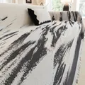 Chenille sofa cover with abstract black and white ink pattern and tassel edges - 180x130 / Ink Wash Black