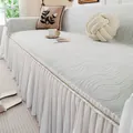 French cream style chenille sofa cover in light green wave texture with white ruffled hem - Flowing Green