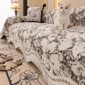 Beige chenille sofa cover with floral pattern and decorative tassel edges for living room - 180x380cm / Brown